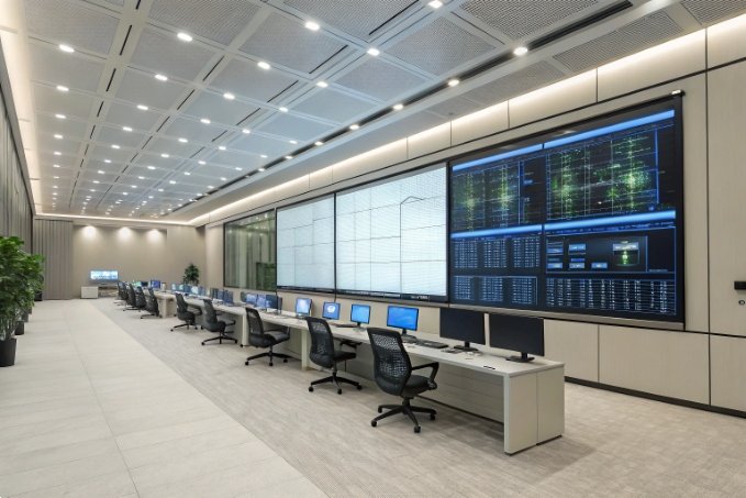 Modern control room with multiple screens